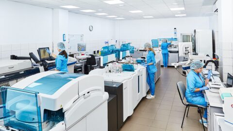 1280px A group of scientists working in a laboratory Esculab