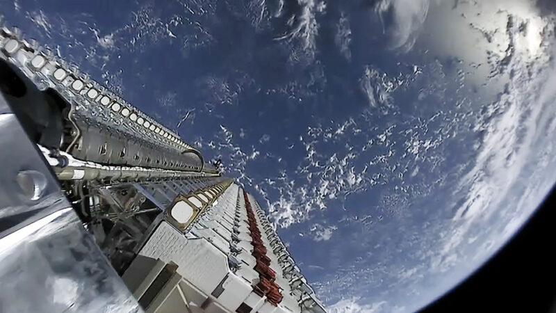 Starlink satellites deploying above Earth